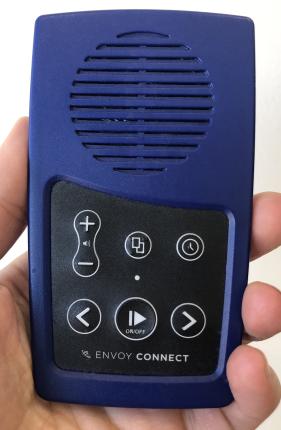 picture of a hand holding an Envoy Connect device
